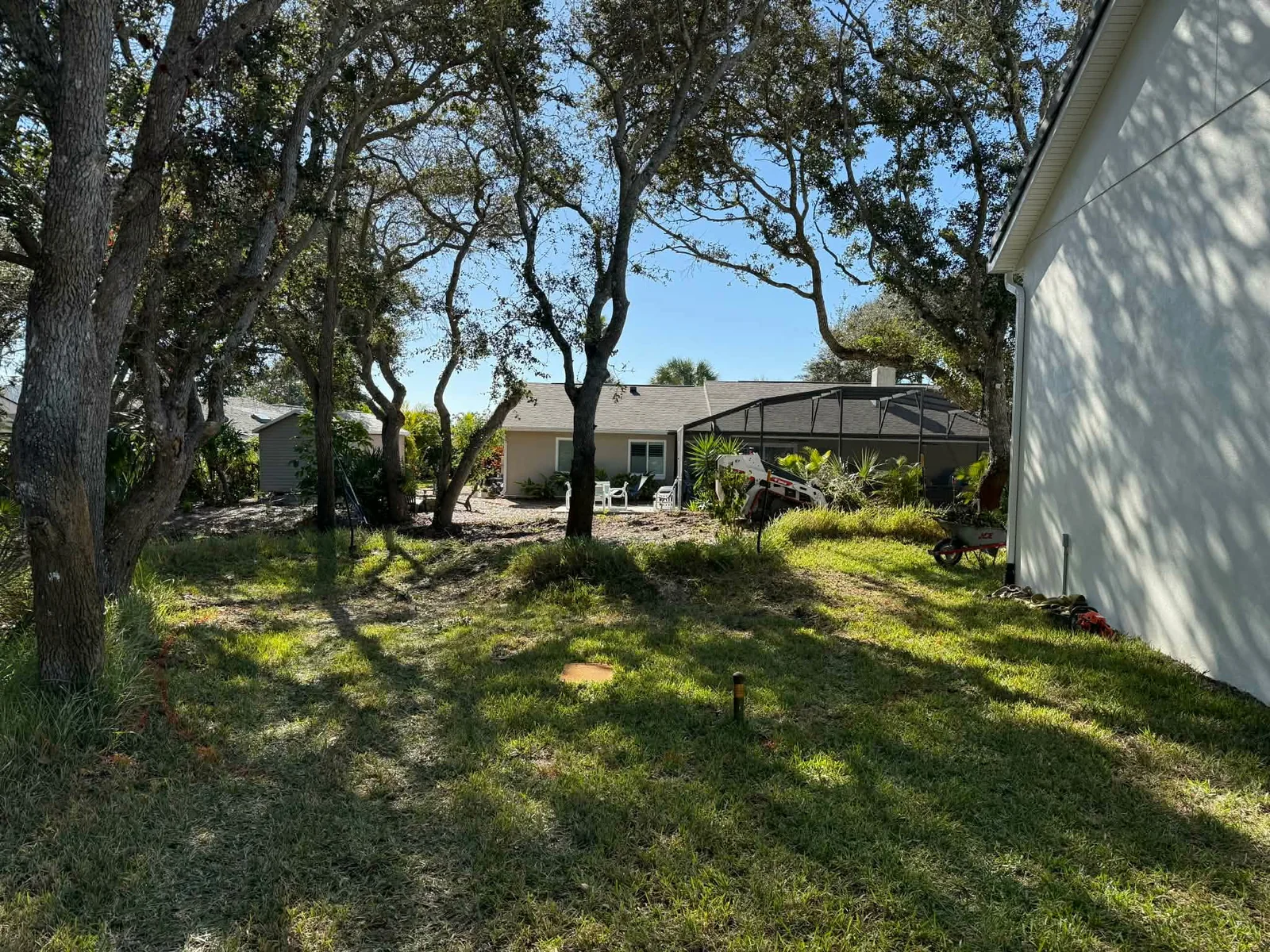 Backyard before a landscape and hardscape installation